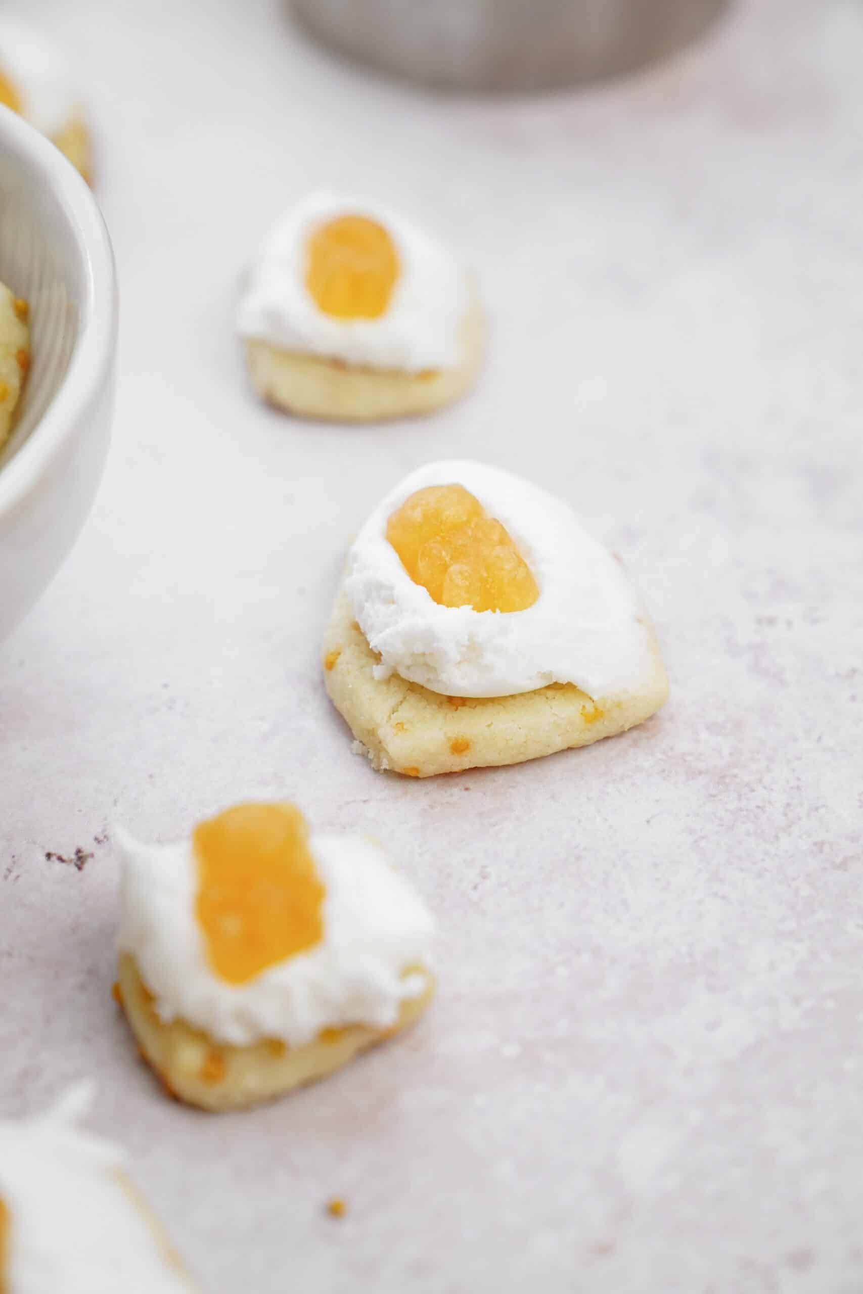 Holiday Shortbread Bites with gummy and icing on top 