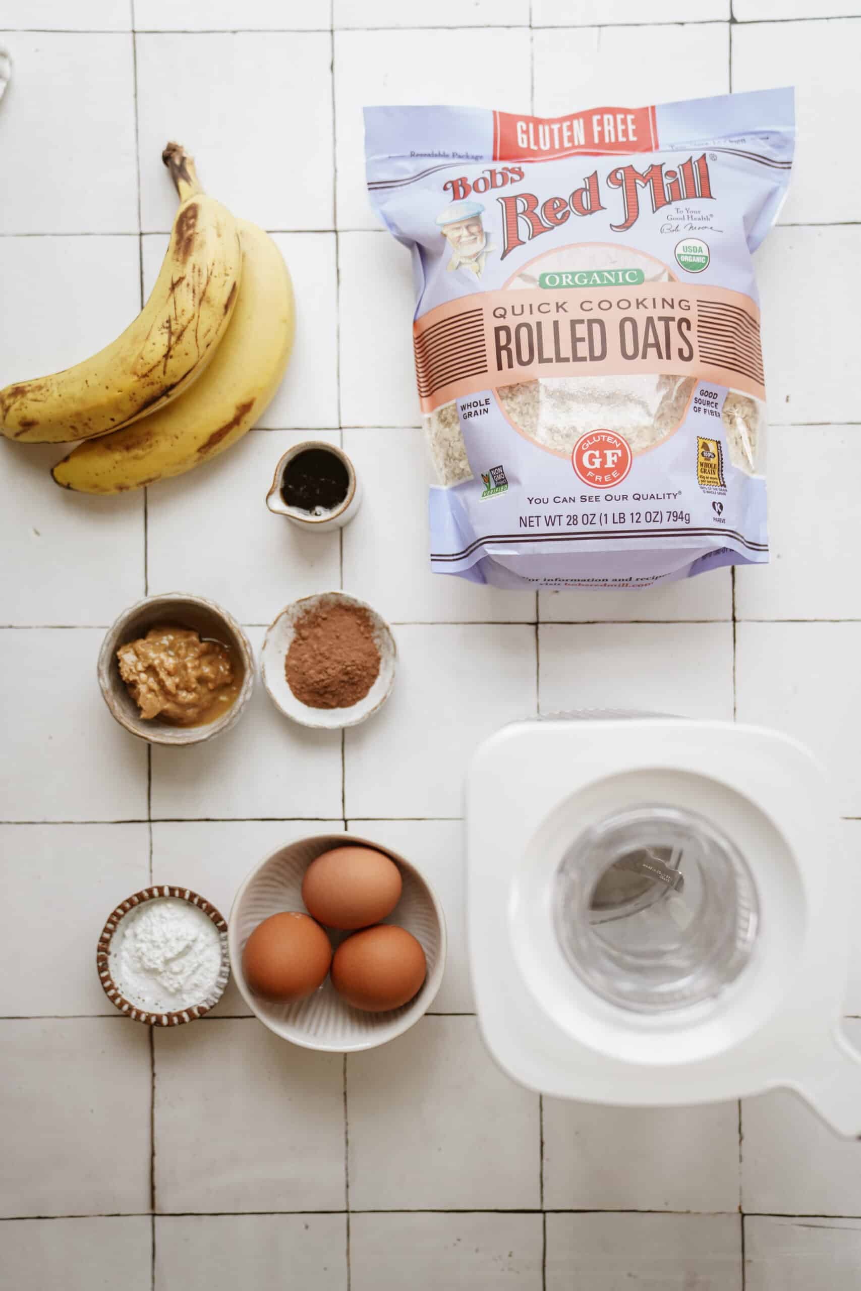 Ingredients for baked oats recipe spread out on a counter