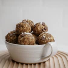 Big bowl of energy bites on cutting board