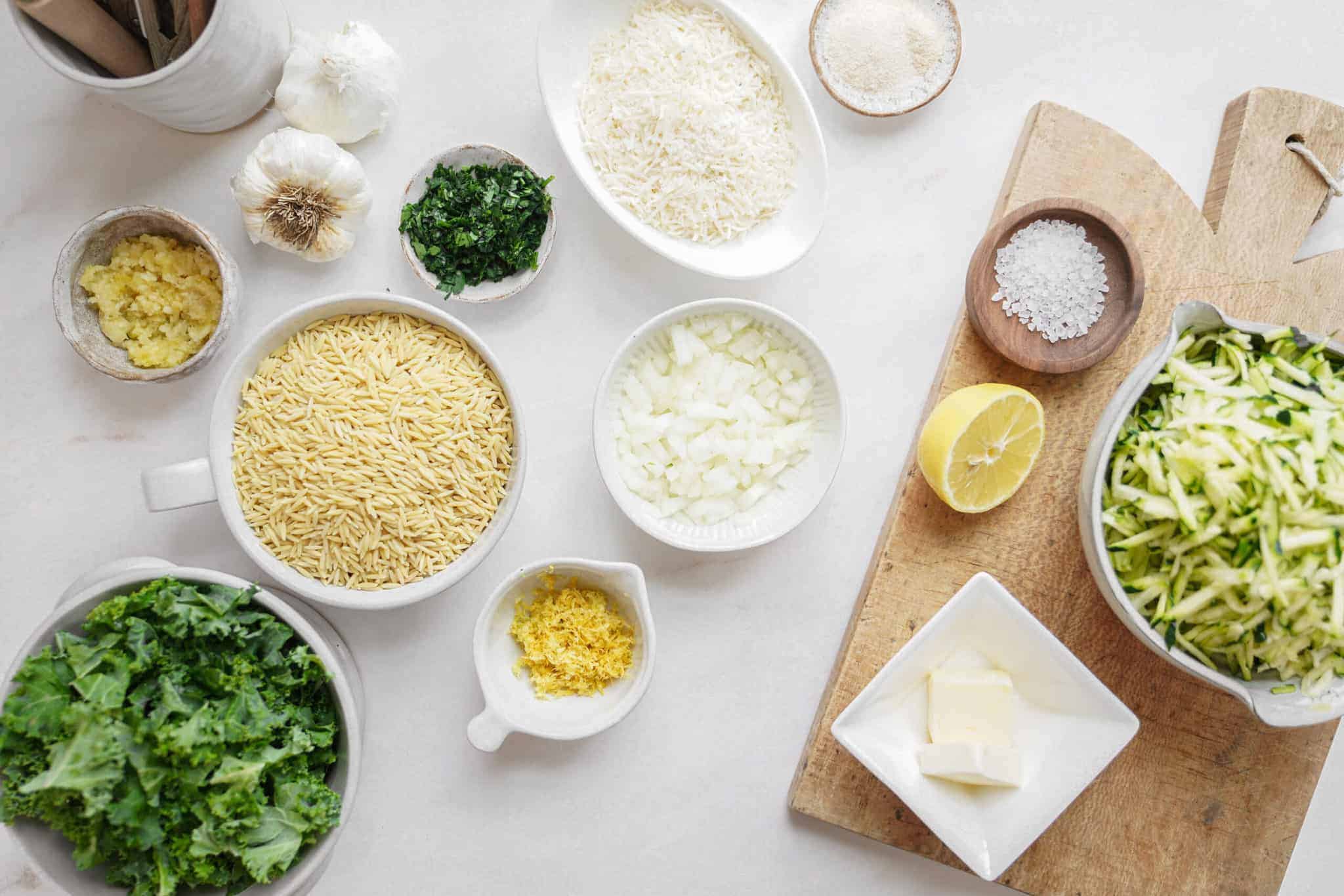 Fresh ingredients for lemon chicken orzo soup on counter