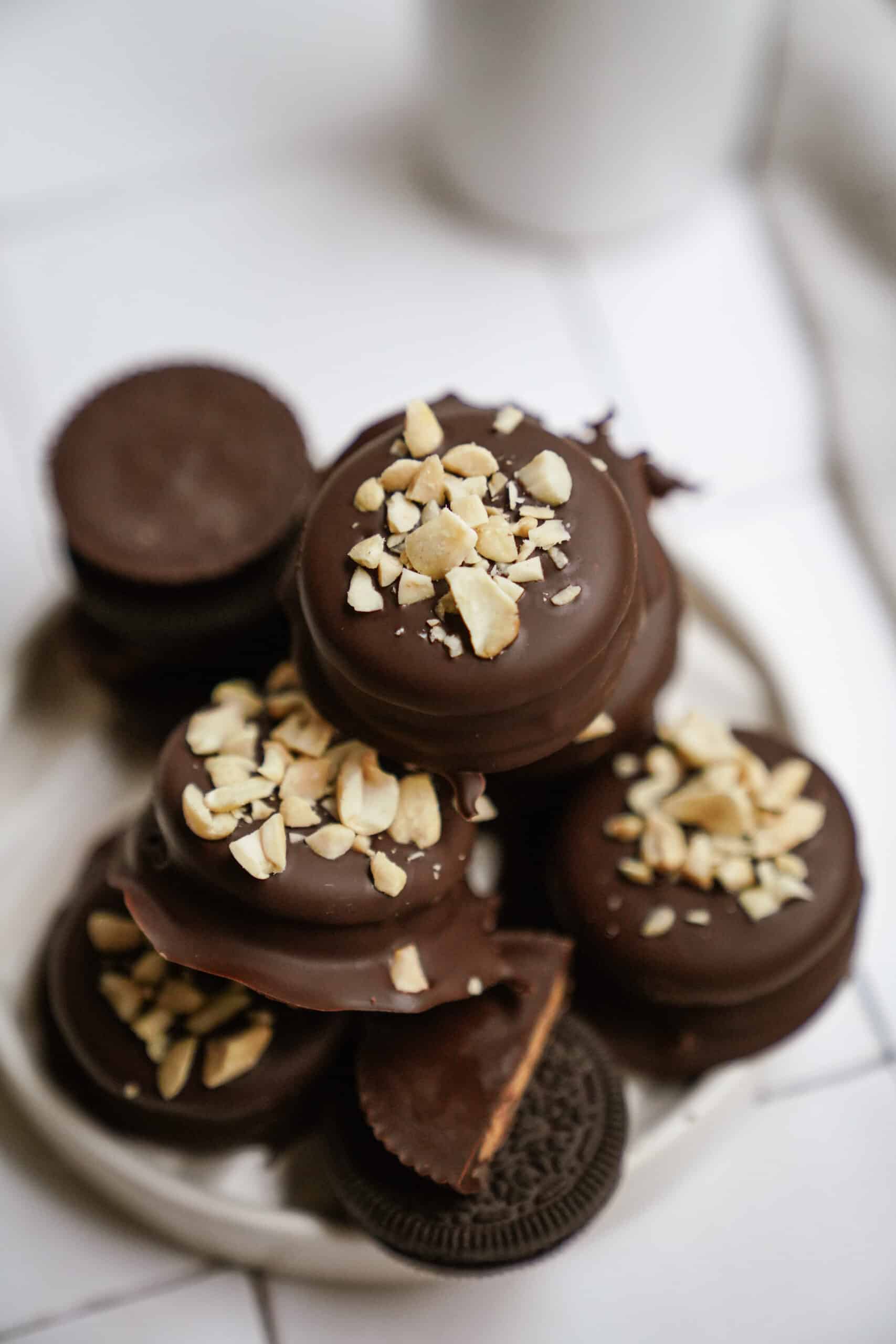 Stack of Chocolate Dipped Peanut Butter Cup Stuffed Oreos