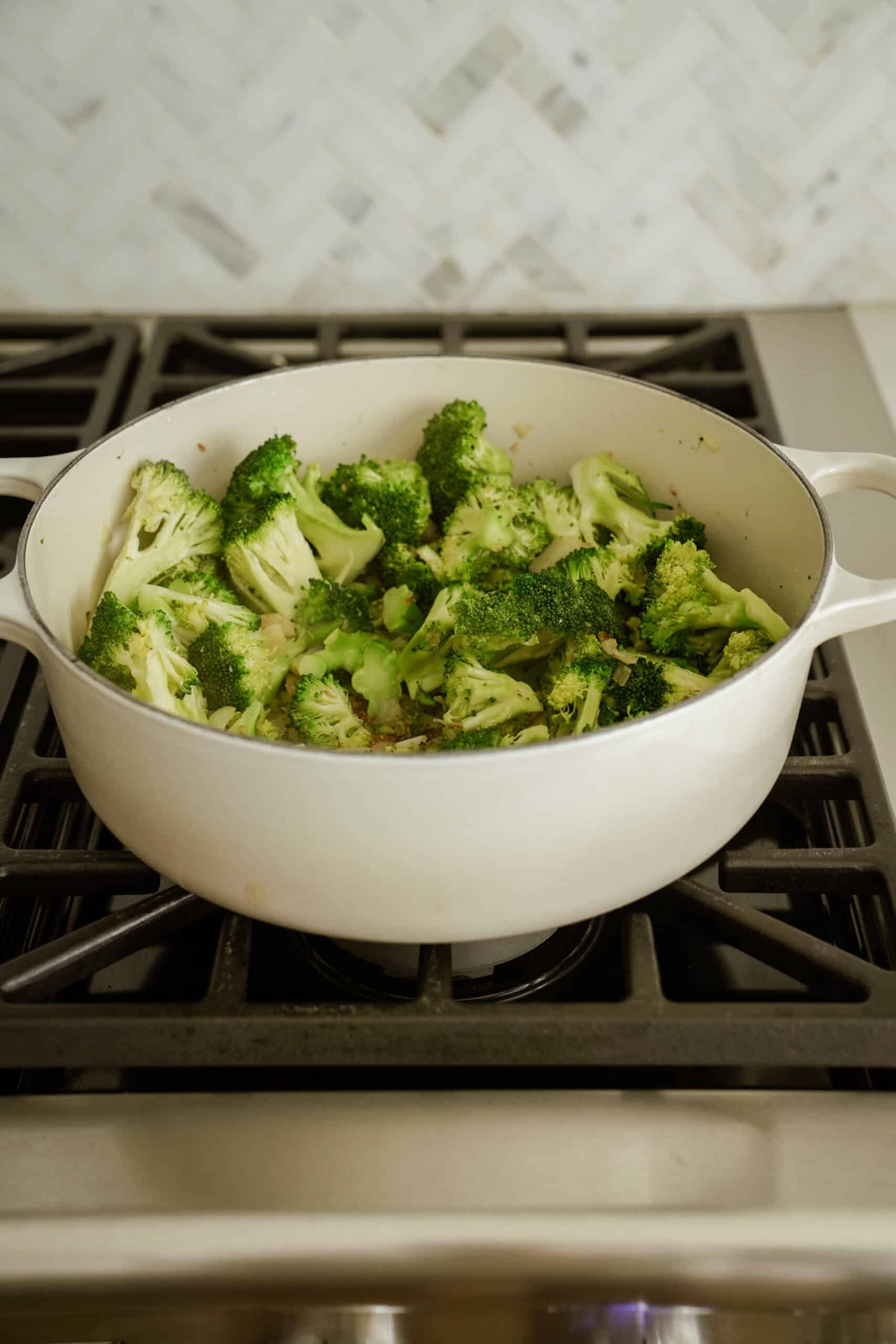 Broccoli added to pot for broccoli soup