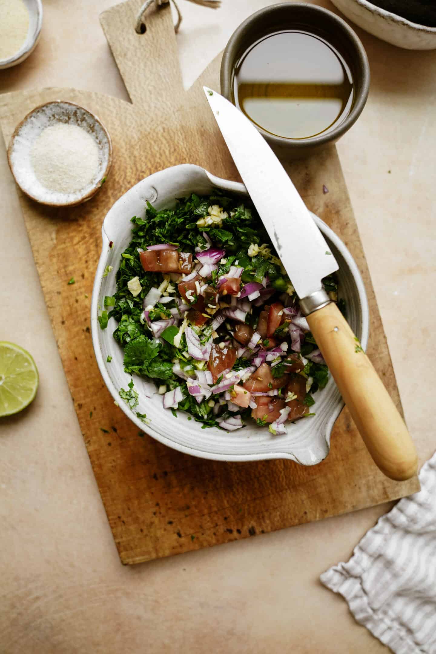 Shopped ingredients for guacamole in a bowl