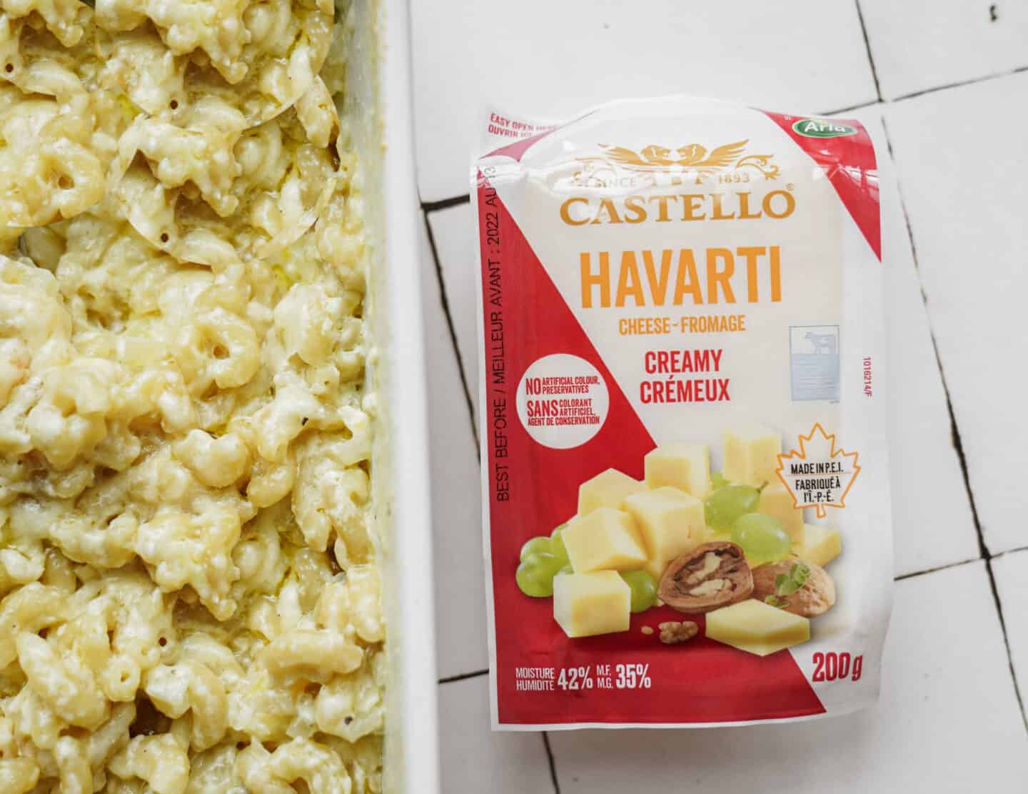 Block of havarti beside one pot mac and cheese