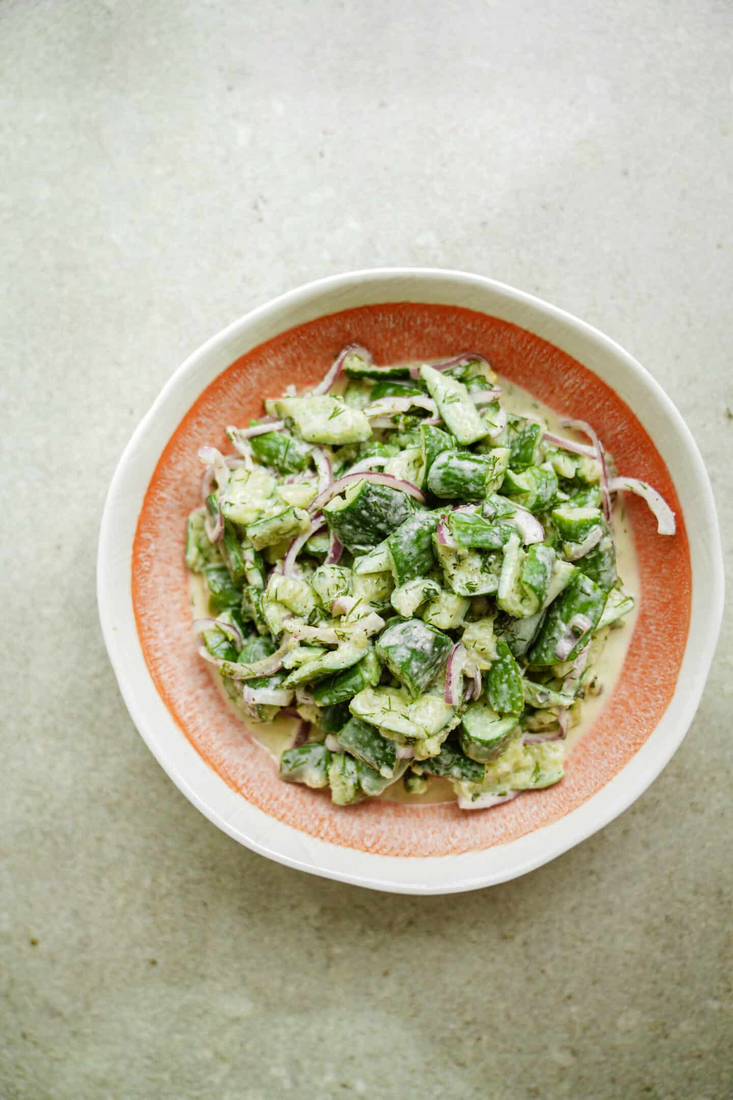 Creamy cucumber salad on a plate