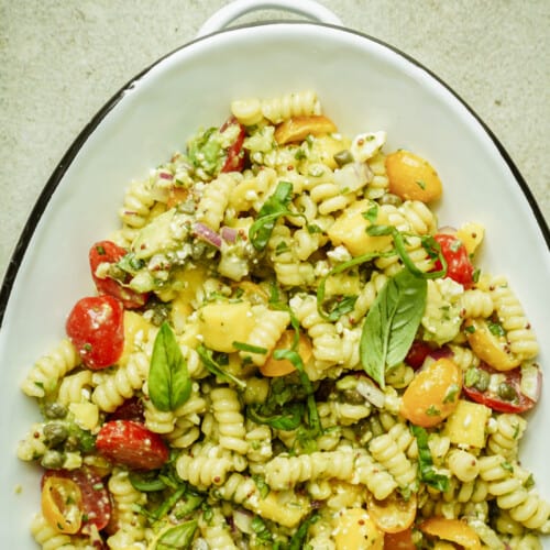 Big serving dish of summer pasta salad