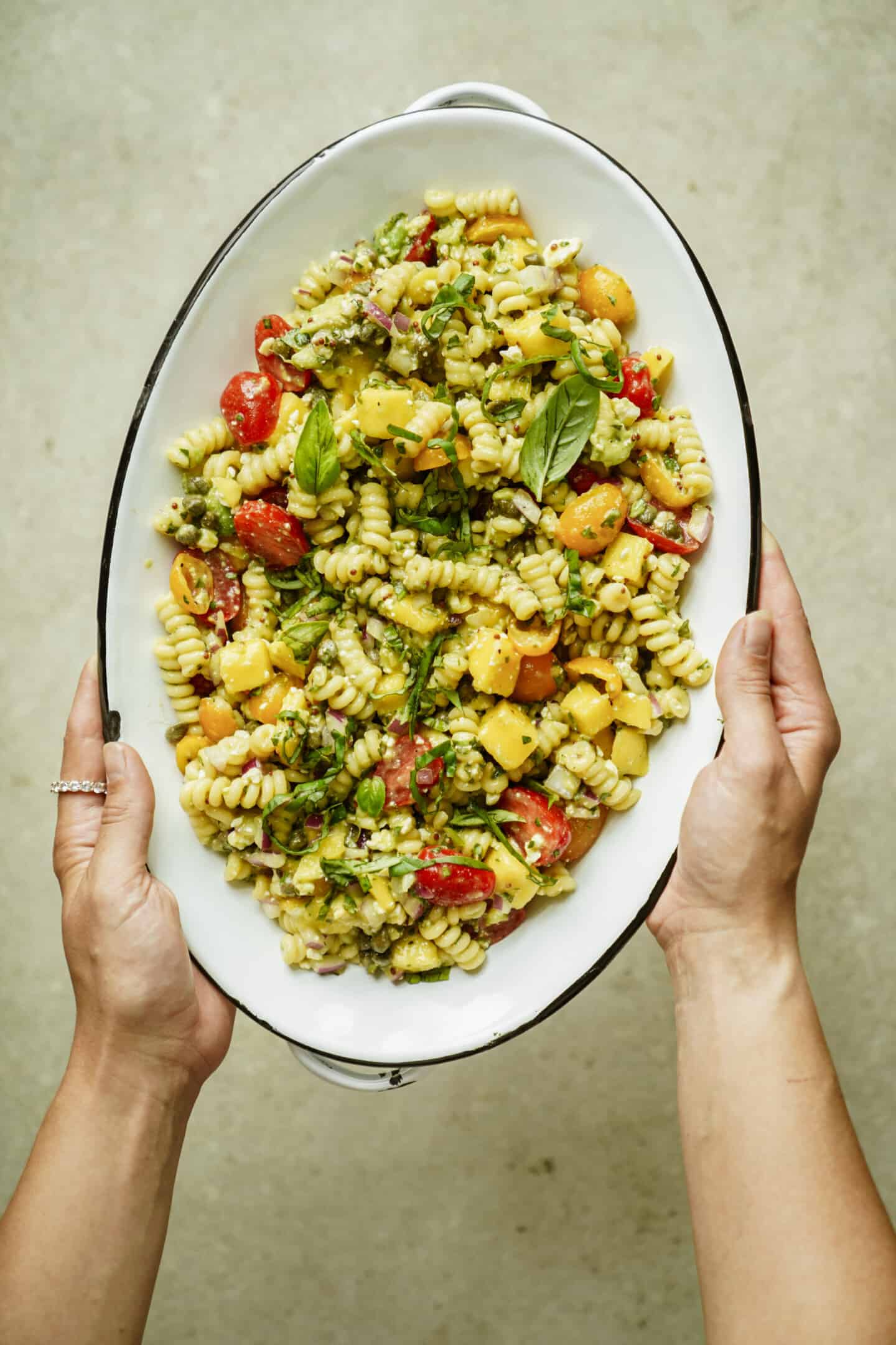 Big serving dish of summer pasta salad