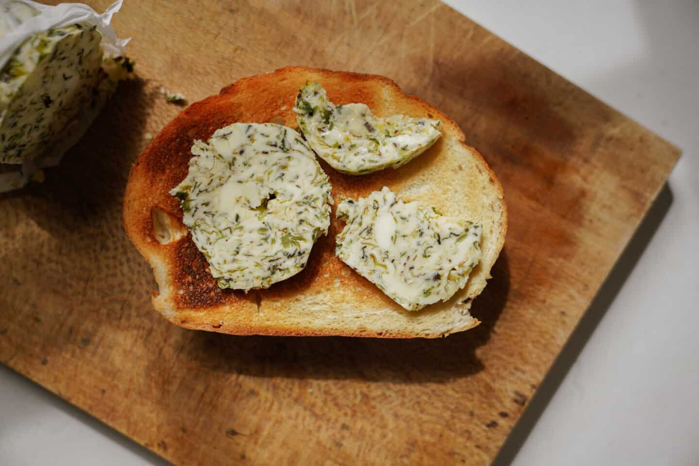 Herb butter on a cutting board