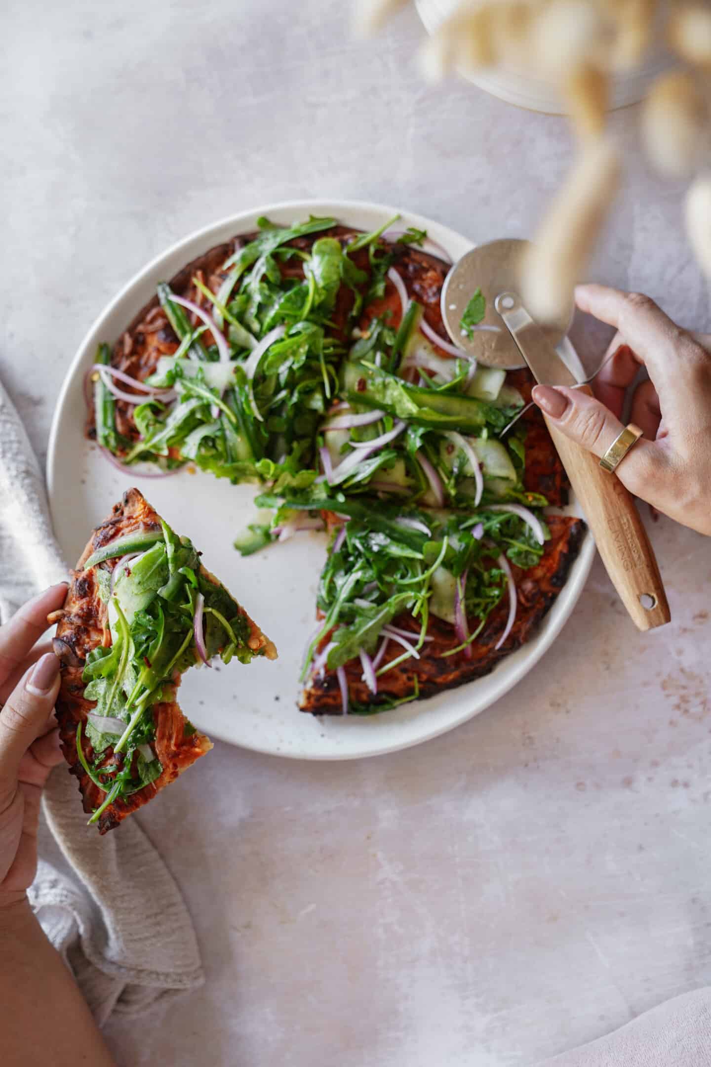 Cauliflower pizza crust on a plate