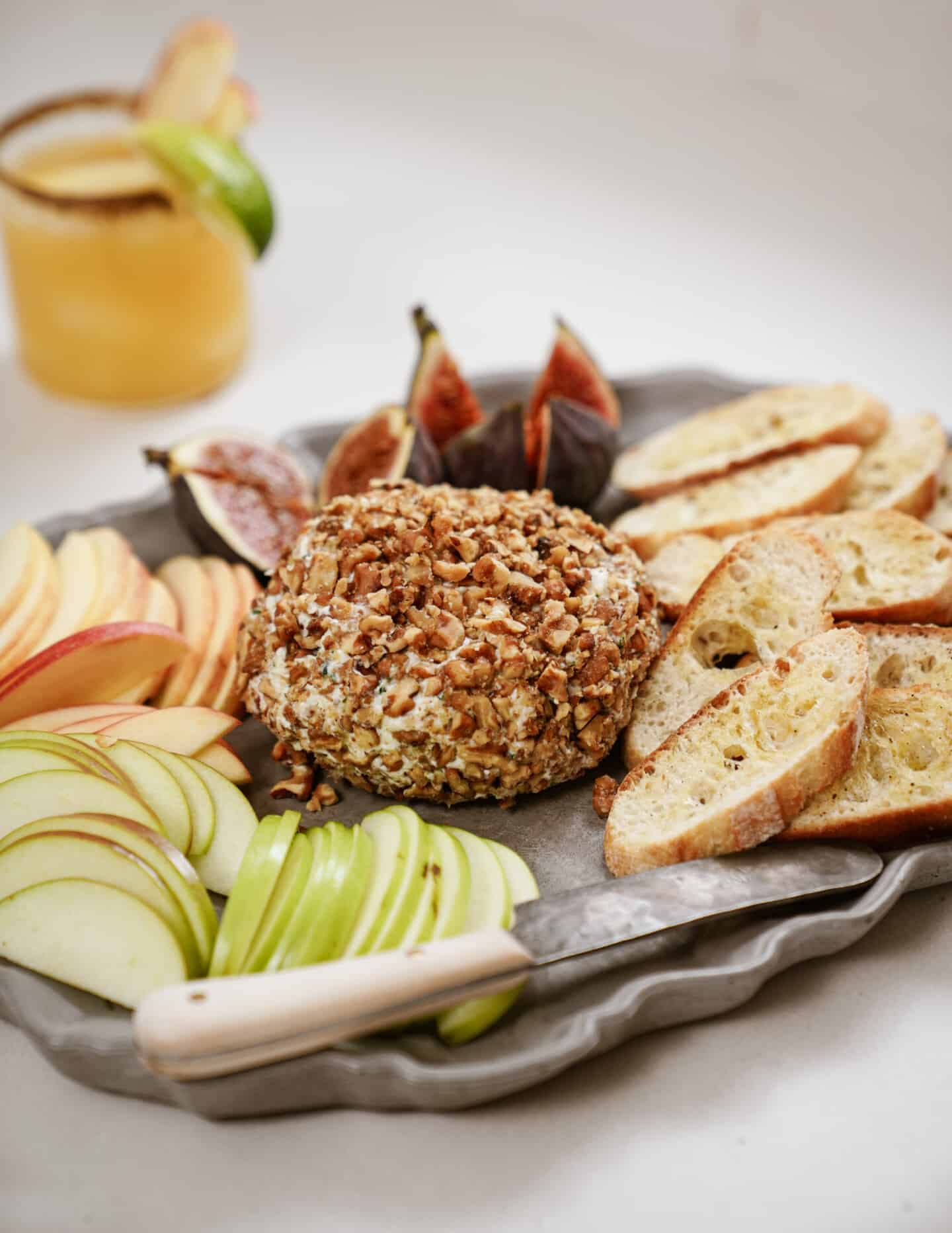 Cheese ball recipe on a serving platter