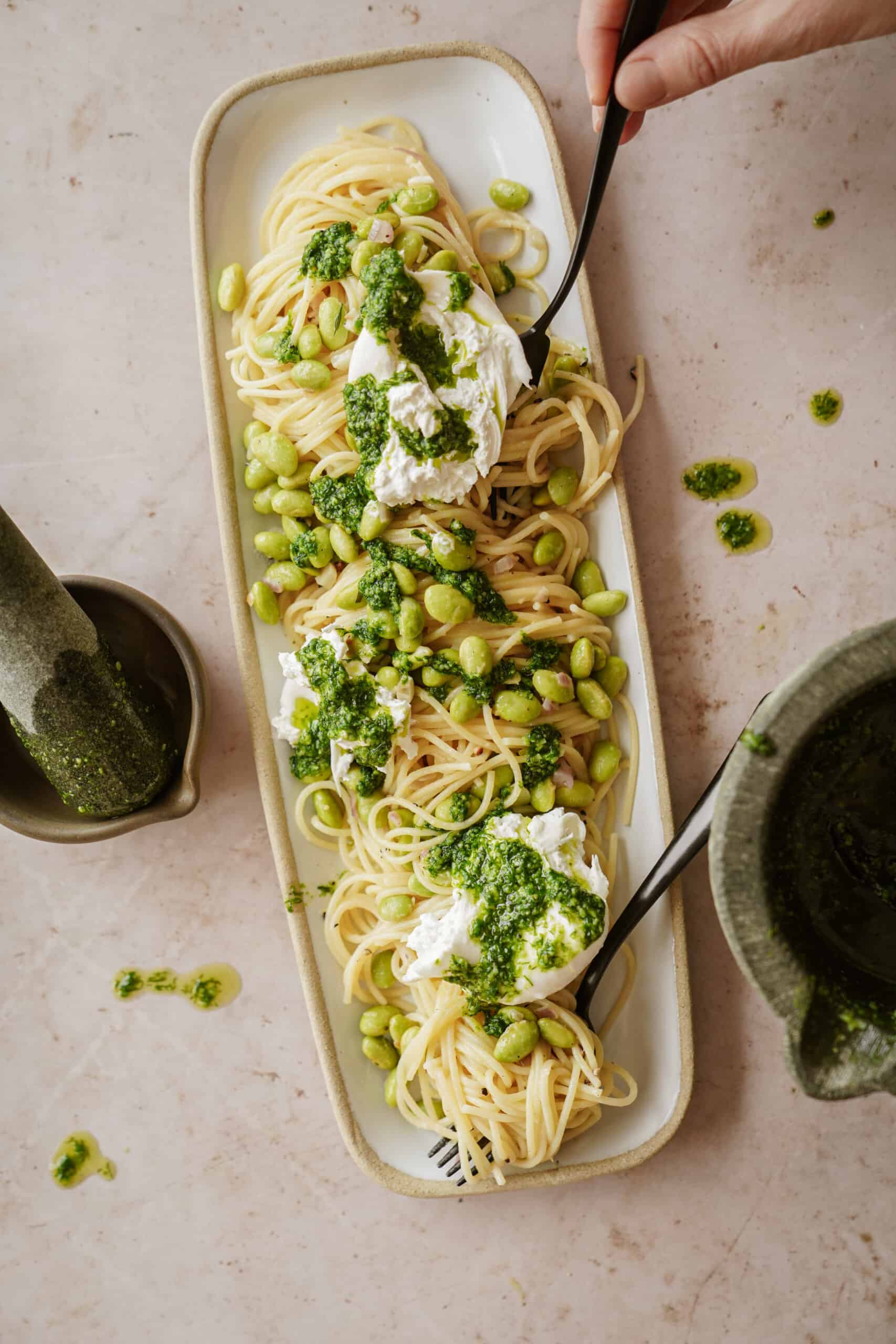 Pesto pasta on a serving platter