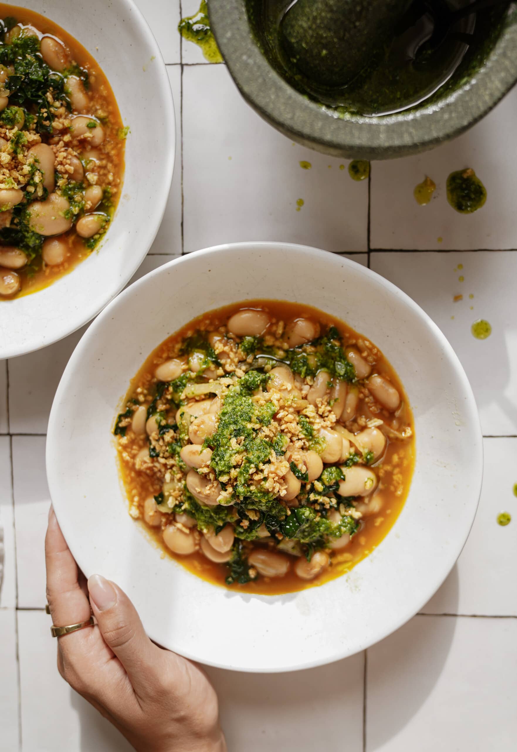 Bean stew in a white bowl