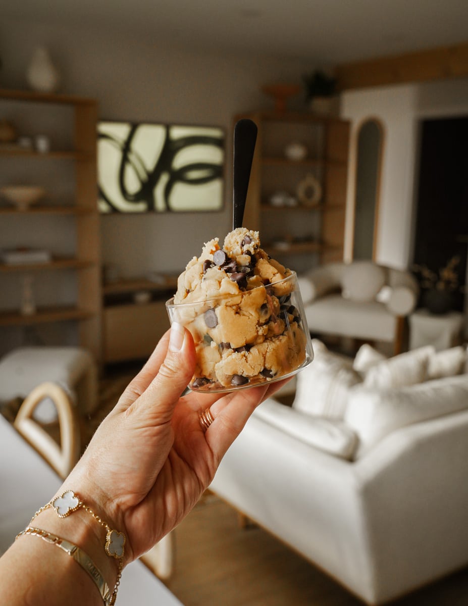 Hand holding edible cookie dough