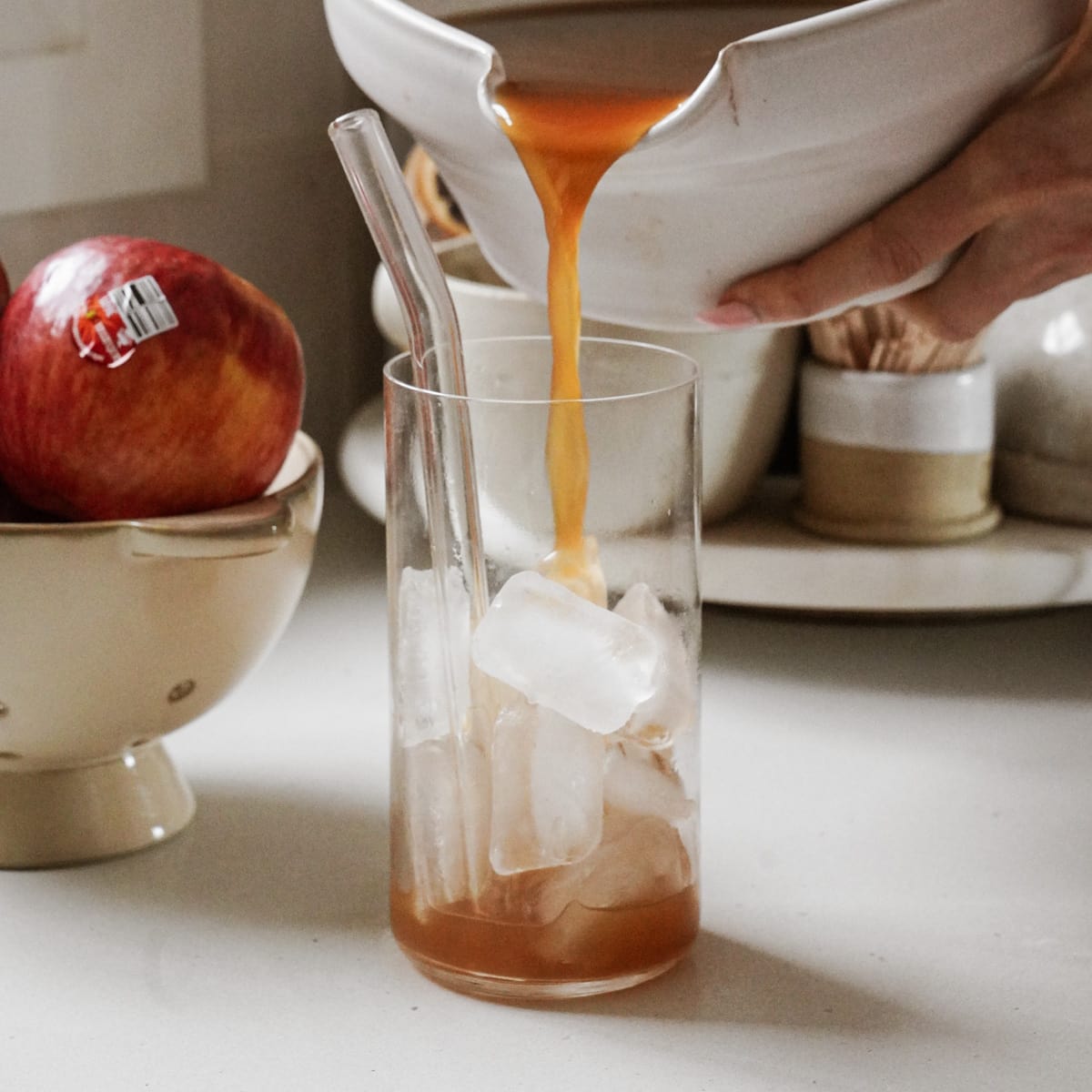 Apple Juice Recipe being poured into a glass