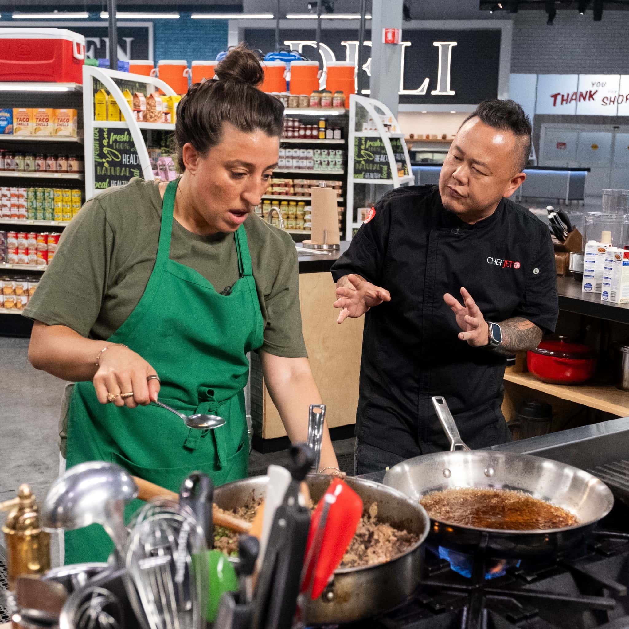 Maria cooking while Jet talks