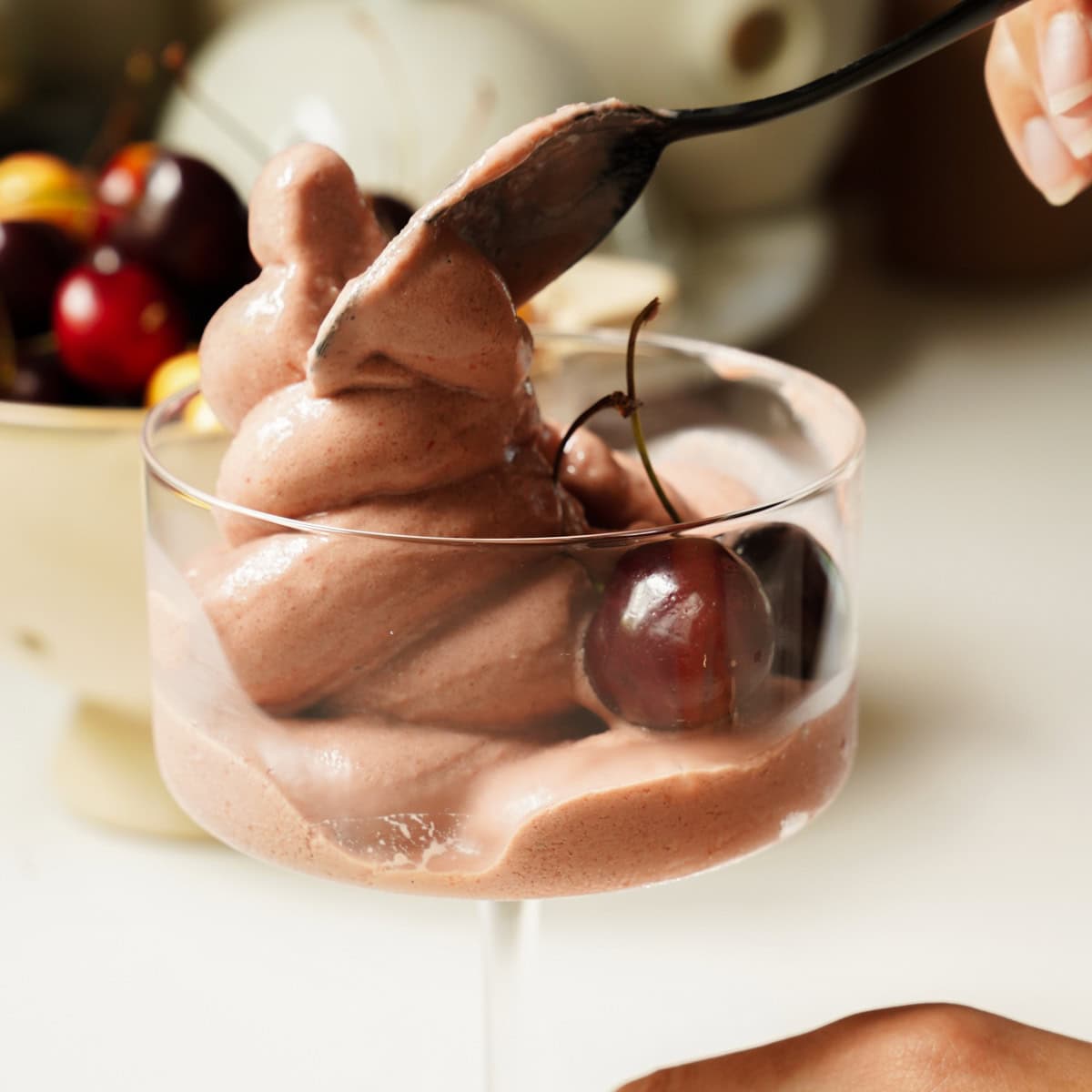 Cherry Frozen Yogurt Recipe in a cup with fresh cherries