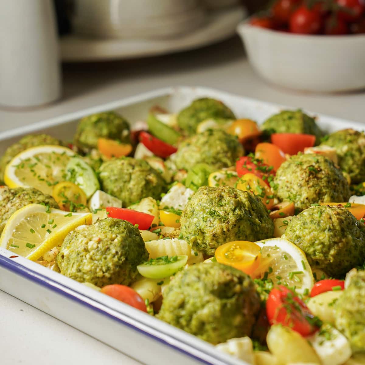 Up close of meatballs and veggies on a tray