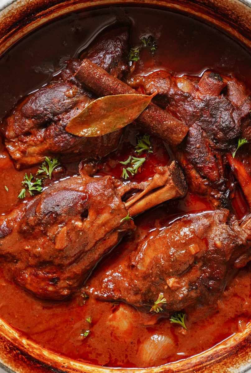 Close up of braised lamb shanks